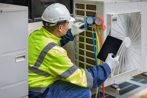 Professional Air Conditioning Repair technician working in Shirley, NY